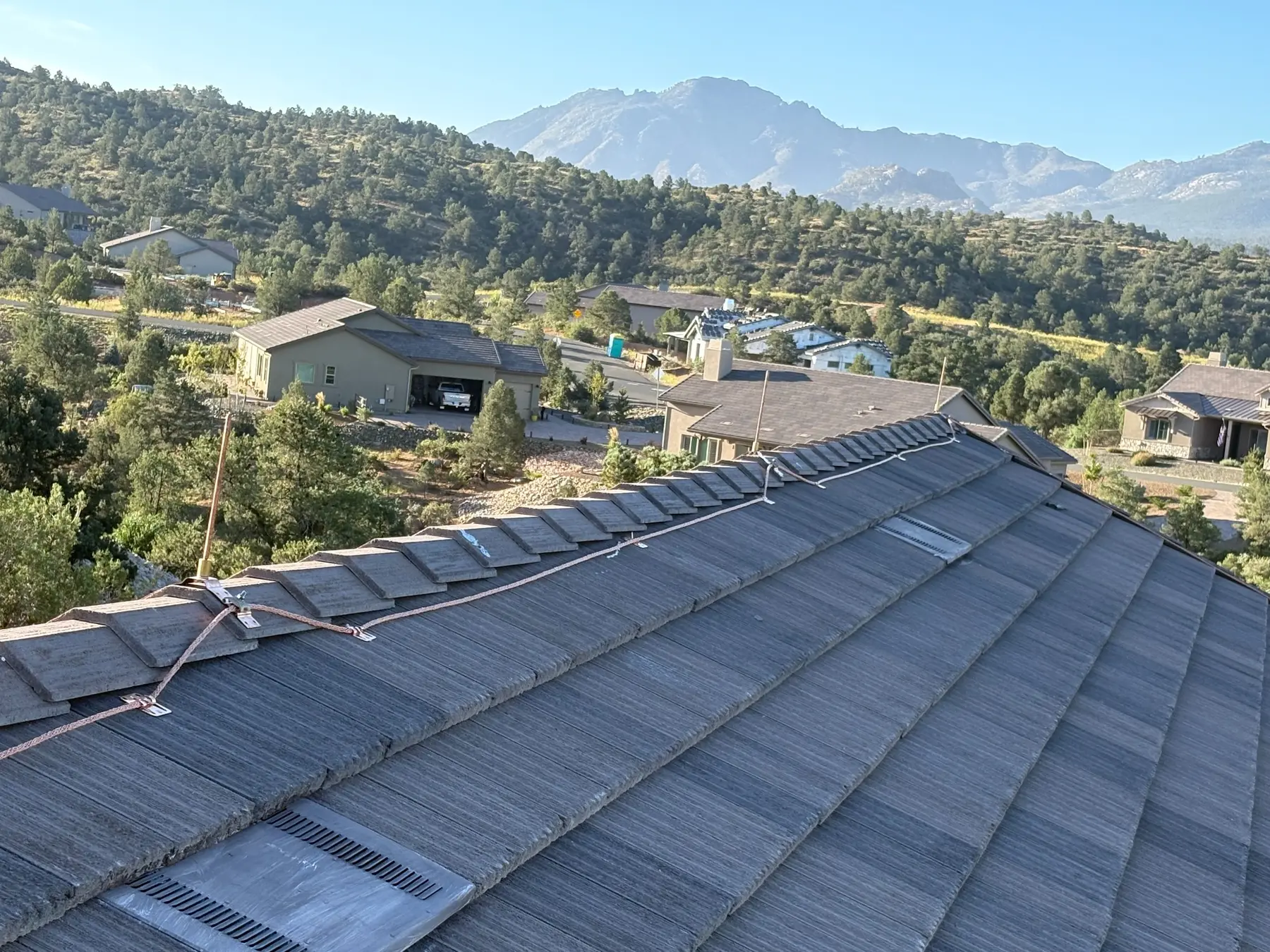 Copper lightning protection conductors and air terminals installed on a Prescott Arizona tile roof