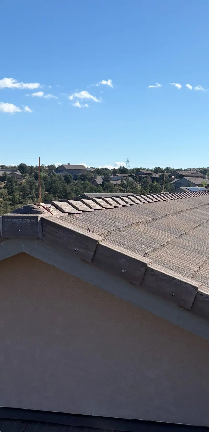 Copper lightning rod system installed along residential roofline in Prescott