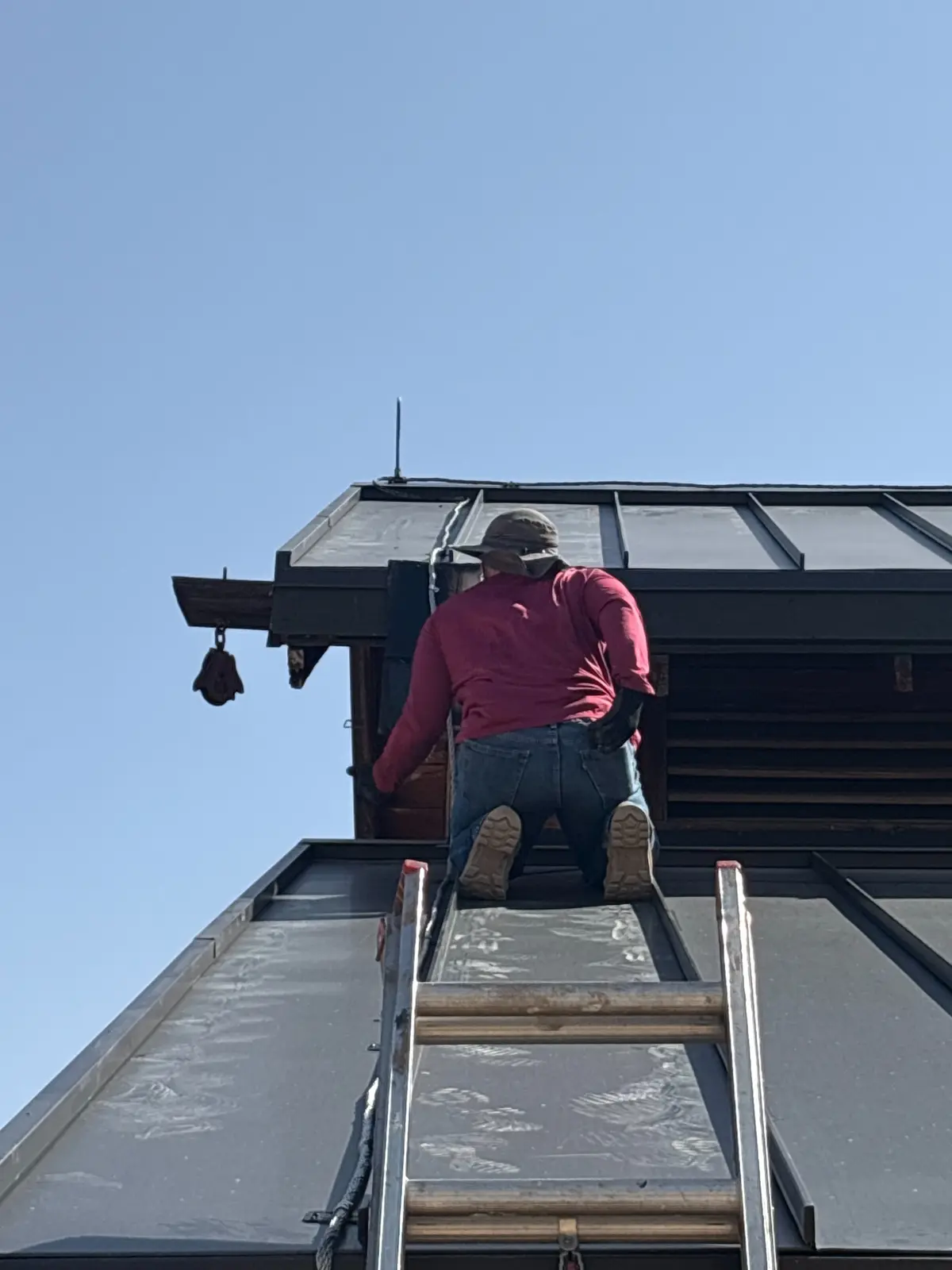 Lightning protection contractor installing an air terminal on a Scottsdale horse barn roof