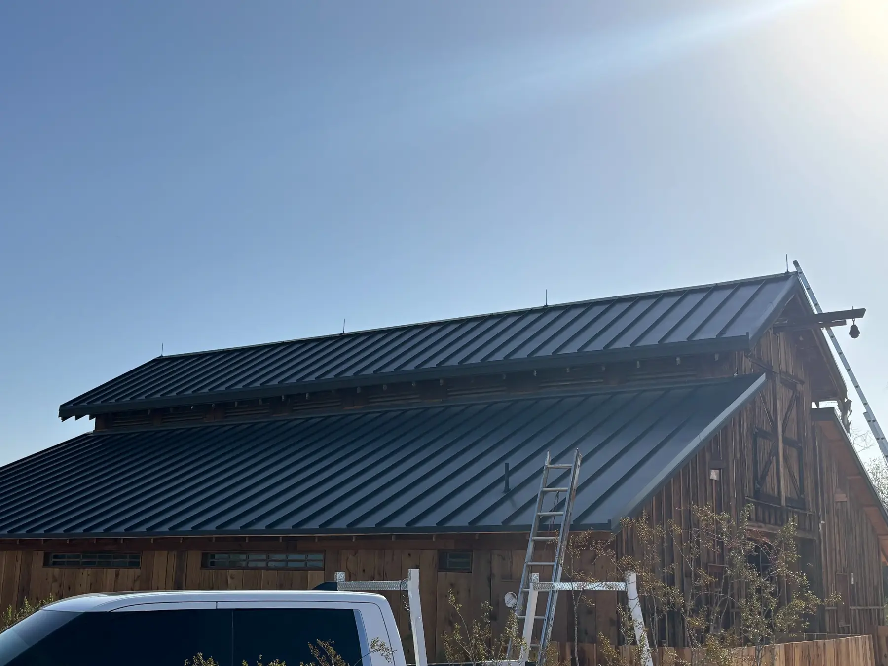Completed lightning protection system on a Scottsdale Arizona horse barn standing-seam metal roof